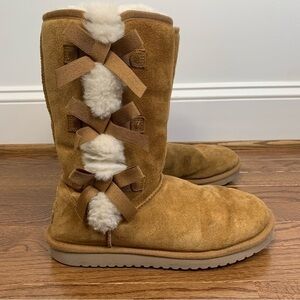 NFS. Koolaburra by Ugg classic tan/brown boots with bows on the side size 10